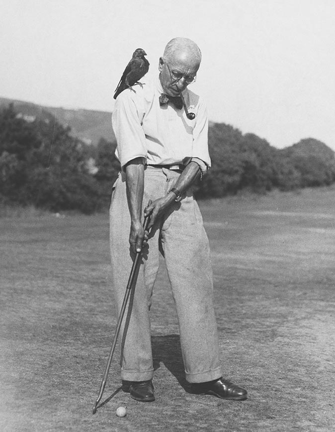 Golfer With His Pet Jackdaw, 1933